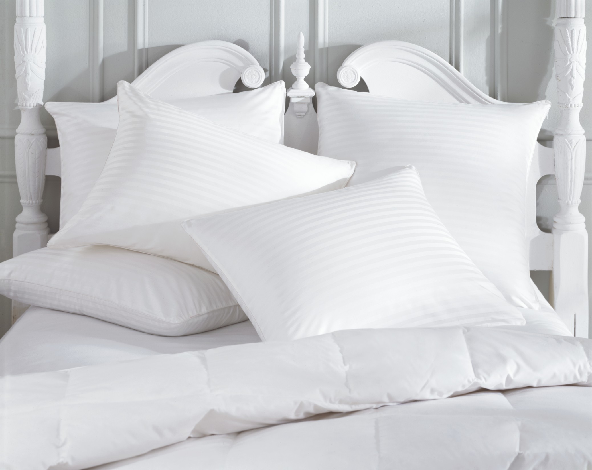 The Down Factory Store offers down bed comforters and discount down